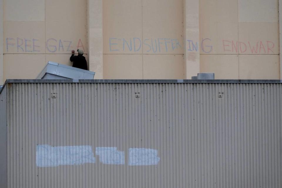 “Free Gaza” writes a protester on the wall of a campus building on Tuesday at Cal Poly Humboldt, where demonstrators have locked themselves inside an administrative building.