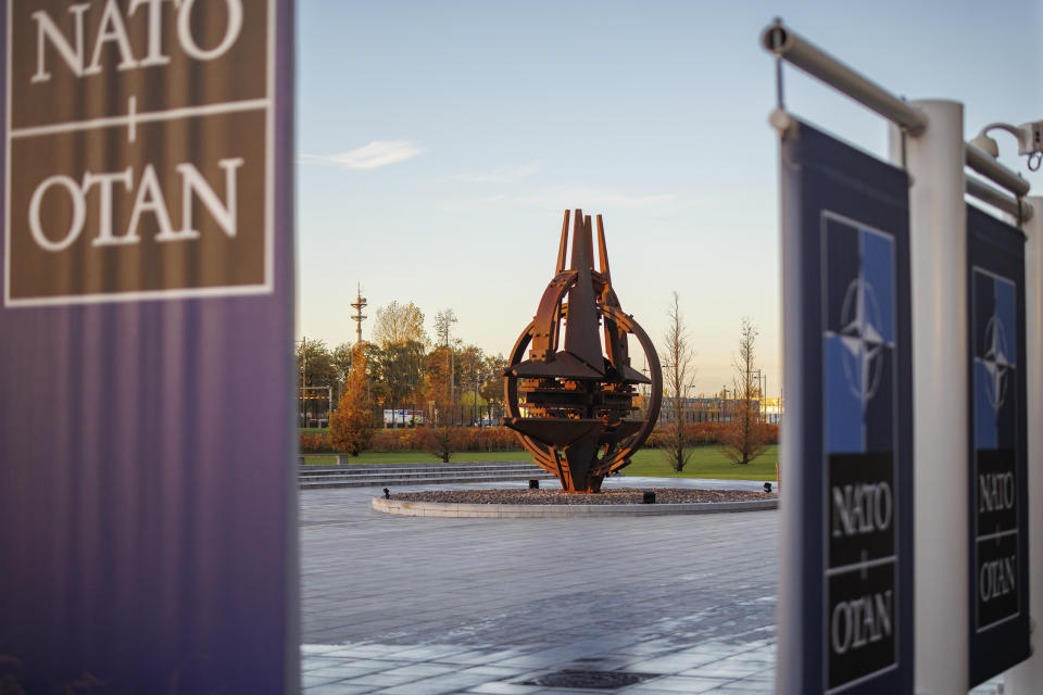 A sculpture is pictured outside the NATO headquarters, Wednesday, Nov. 16, 2022 in Brussels. Ambassadors from the 30 NATO nations gathered for emergency talks after Poland said that a Russian-made missile fell on its territory killing two people and U.S. President Joe Biden and his allies promised support for the investigation into the incident. (AP Photo/Olivier Matthys)