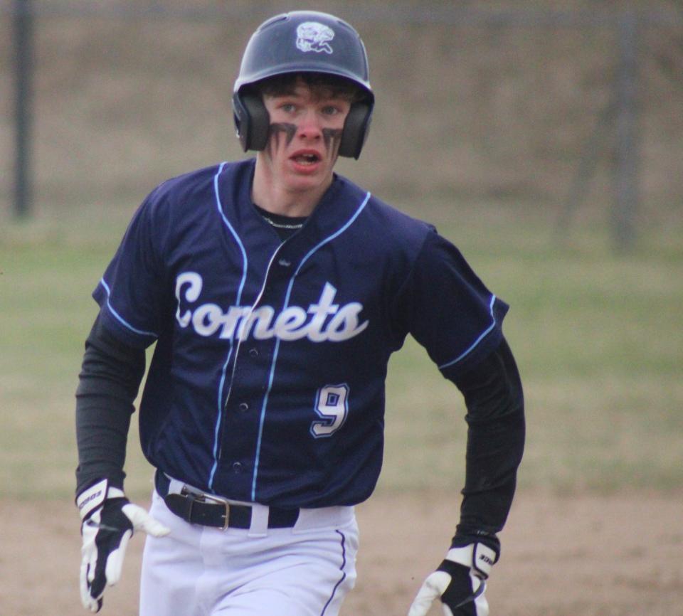 Mackinaw City's Trystan Swanson rounds second base and heads for third during a matchup with Pickford this week.