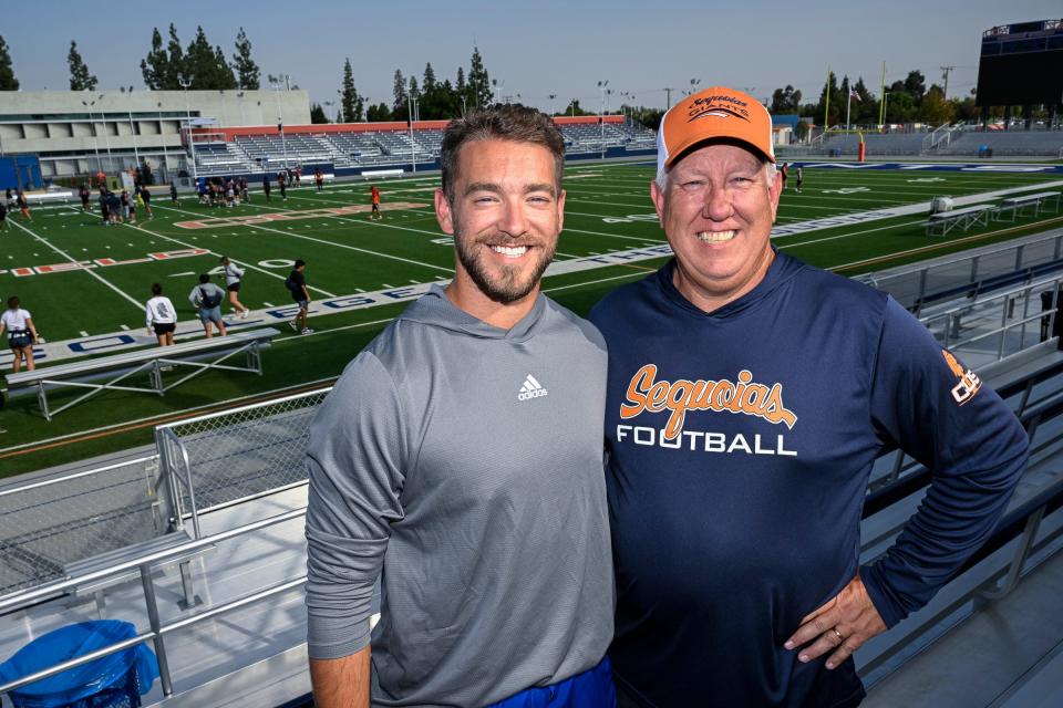 College of the Sequoias football coaches Donovan McJunkin, right, and his son Trey McJunkin are coaching together for the first time. Donovan is the assistant head coach and tight ends coach. Trey is the receivers coach and passing game coordinator.