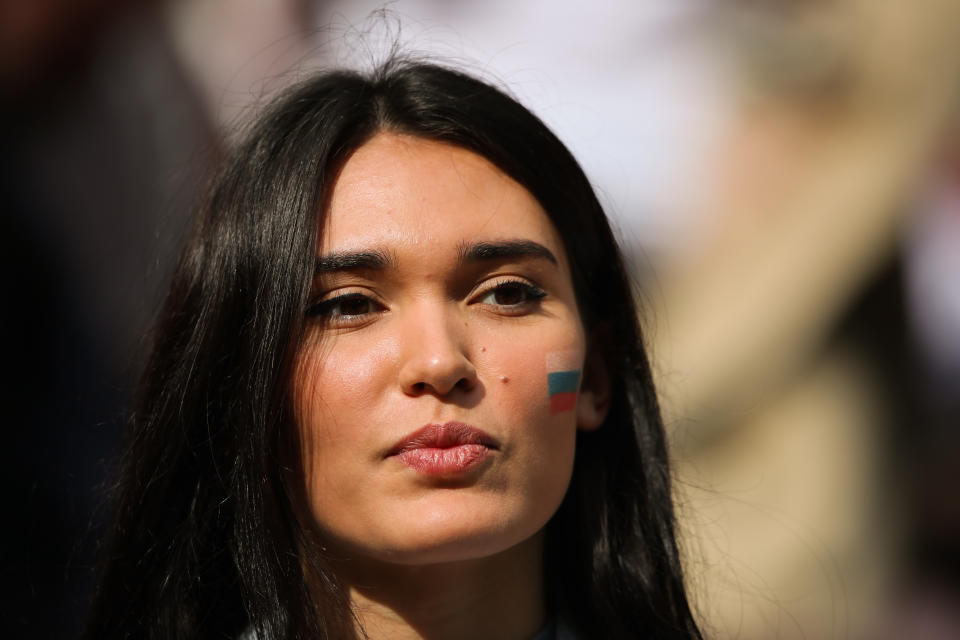 <p>A female fan of Russia looks on prior to the 2018 FIFA World Cup Russia group A match between Russia and Saudi Arabia at Luzhniki Stadium on June 14, 2018 in Moscow, Russia. (Photo by Matthew Ashton – AMA/Getty Images) </p>