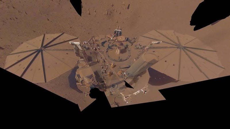 InSight's final selfie shows the lander covered in dust.