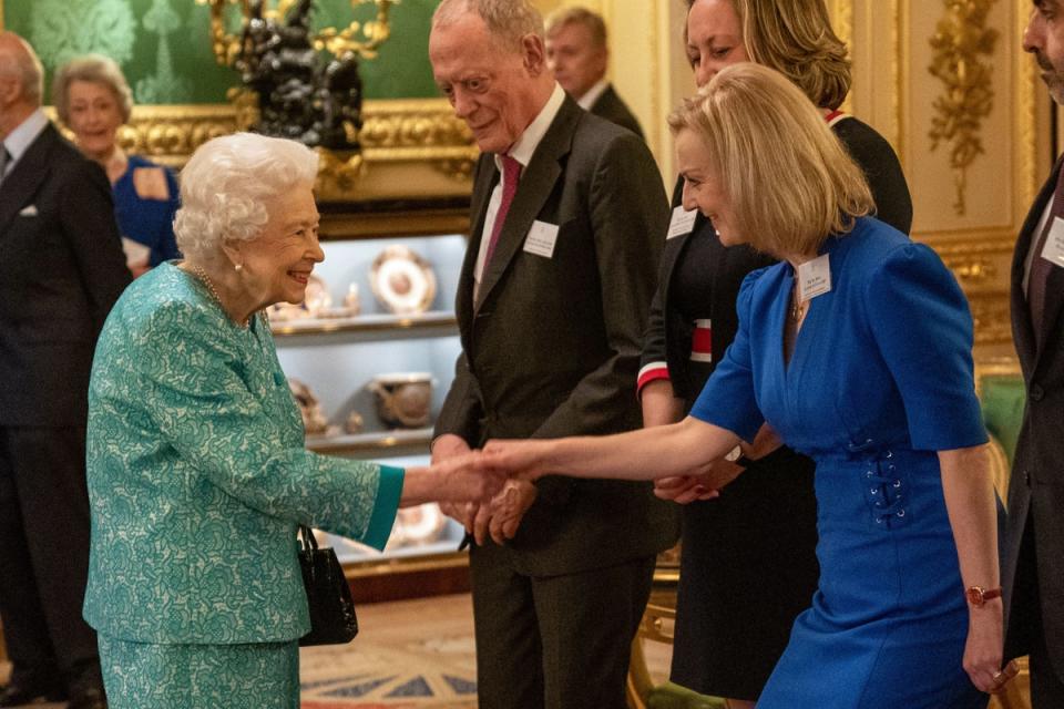 Queen Elizabeth II greeting Liz Truss (PA)