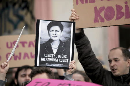 People demonstrate against the Polish government's plans of tightening the abortion law in Poznan, Poland April 3, 2016. REUTERS/Piotr Skornicki/Agencja Gazeta