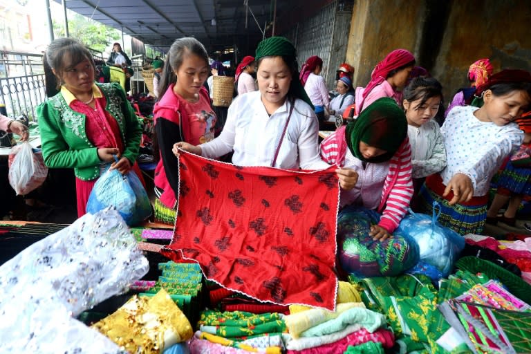 Traffickers target girls at the busy weekend market, where they roam around in packs dressed in their Sunday best