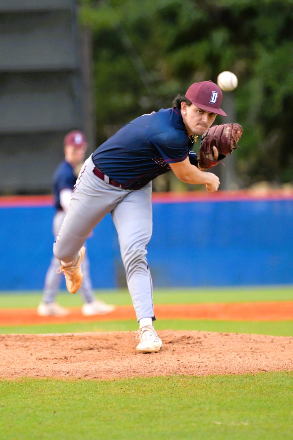 Dwyer pitcher Nick Rovitti fires a pitch from the mound during a regular season game against Palm Beach Gardens on Mar. 21 2024.