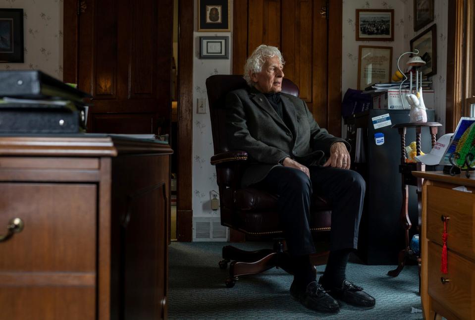 George Moses, 81, owner of The Marketeer, sits in his wife's office in Brighton on Tuesday, March 19, 2024. Moses has owned the local marketing publication for 50 years.