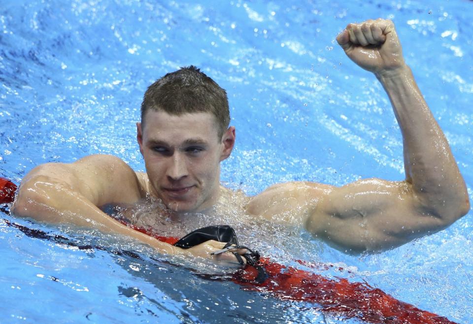 Ryan Murphy celebrates after winning the gold medal in the 100 backstroke. (Reuters)