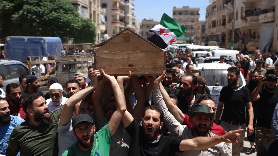 Syrians attend the funeral procession of a man killed during clashes with Turkish troops, in Afrin in northern Syria on July 2. - Aaref Watad/AFP/Getty Images