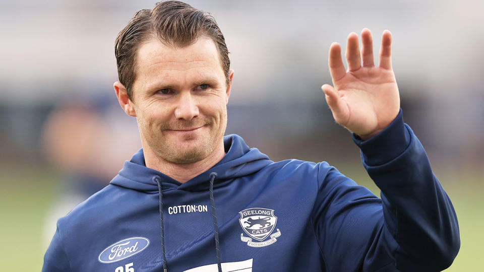 Pictured here, Patrick Dangerfield gestures towards someone at Geelong training.