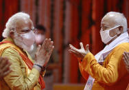 Indian Prime Minister Narendra Modi performs rituals during the groundbreaking ceremony of a temple dedicated to the Hindu god Ram, in Ayodhya, India, Wednesday, Aug. 5, 2020.