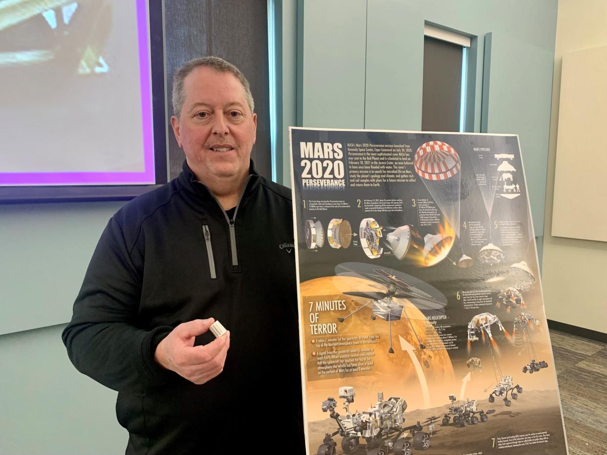 Canal Fulton native Tim Schlernitzauer holds a copy of the specialized bearings that he helped design for the landing gear of the Mars Science Laboratory’s Curiosity rover, which landed on Mars in 2012. Timken Co. also supplied the bearings for the Perserverance rover that landed on Mars in 2021.