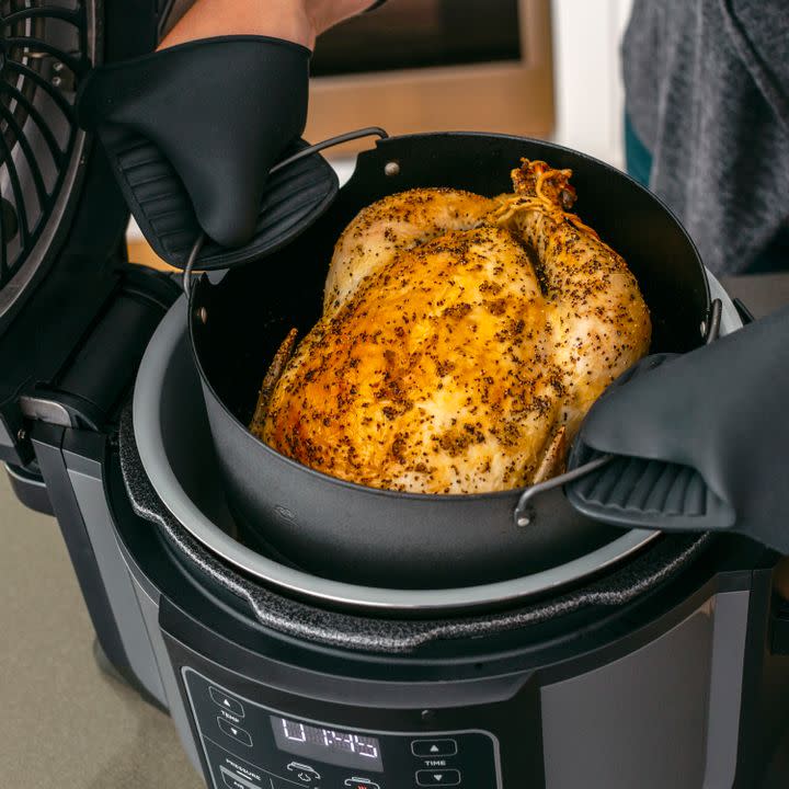 The Ninja Foodi does the work of a pressure cooker, air fryer, steamer and slow cooker all in one. Get it on sale at Walmart right now for $180.