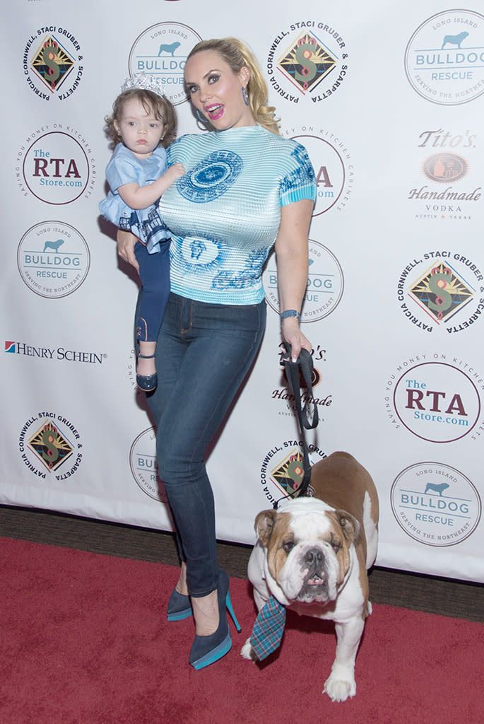 <p>Party of three! Ice-T’s favorite ladies and their best pooch hit the red carpet at the 2017 Bash for the Bulldogs at New York University on Monday. (Photo: Yuchen Liao/Getty Images) </p>