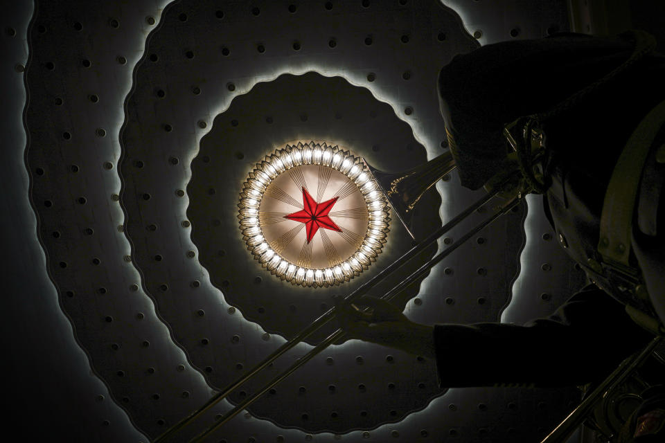 A member of a military band rehearse before a session of China's National People's Congress (NPC) at the Great Hall of the People in Beijing, Sunday, March 12, 2023. (AP Photo/Andy Wong)