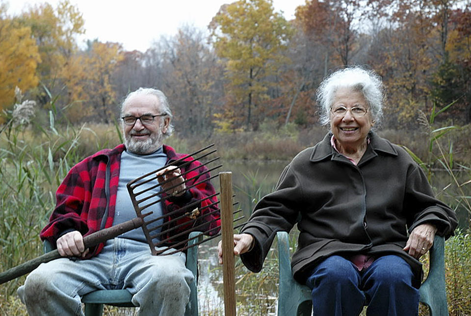 This photo from around 2010 shows Joseph Feingold and his wife Regina at their country house in Ghent, New York. Joseph Feingold died at age 97 of complications from the new coronavirus, four weeks after his brother Alexander, 95, died of pneumonia at the same New York hospital. The brothers were Polish-born Holocaust survivors who had a difficult relationship shaped by the trauma of the war and the loss of their beloved mother and younger brother in Treblinka. (Howard Rosenstein via AP)