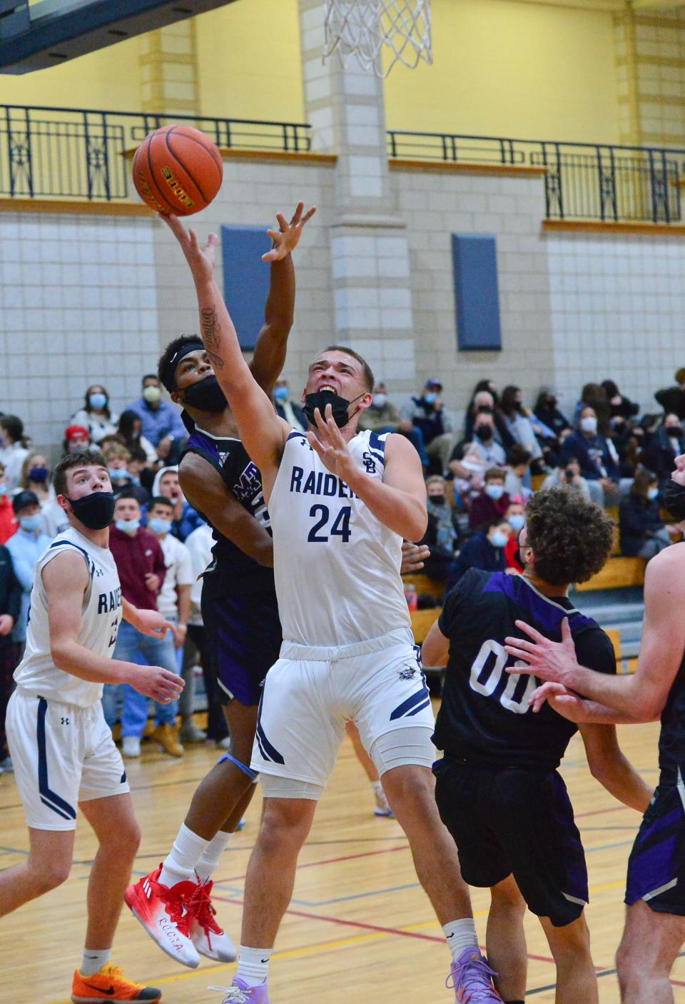 Somerset Berkley's Ethan Dias, seen here shooting during a game against Mt. Hope earlier this season, scored 38 points and grabbed 18 rebounds Friday against Bourne.