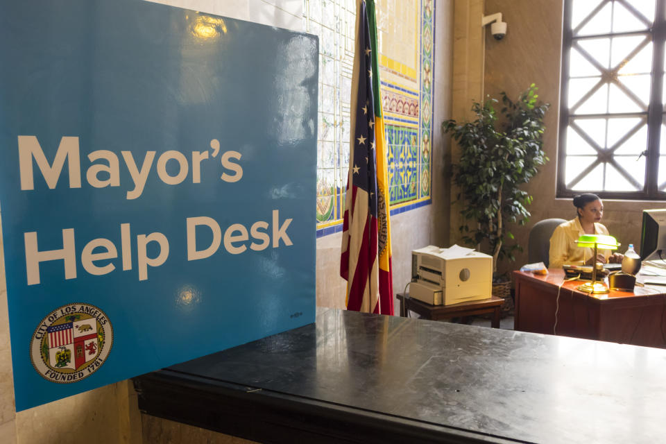Mayor's Help Desk sign. (Photo by: Jeffrey Greenberg/Universal Images Group via Getty Images)