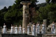 Olympics - Dress Rehearsal - Lighting Ceremony of the Olympic Flame Pyeongchang 2018 - Ancient Olympia, Olympia, Greece - October 23, 2017 Actresses during the dress rehearsal for the Olympic flame lighting ceremony for the Pyeongchang 2018 Winter Olympic Games at the site of ancient Olympia in Greece REUTERS/Alkis Konstantinidis