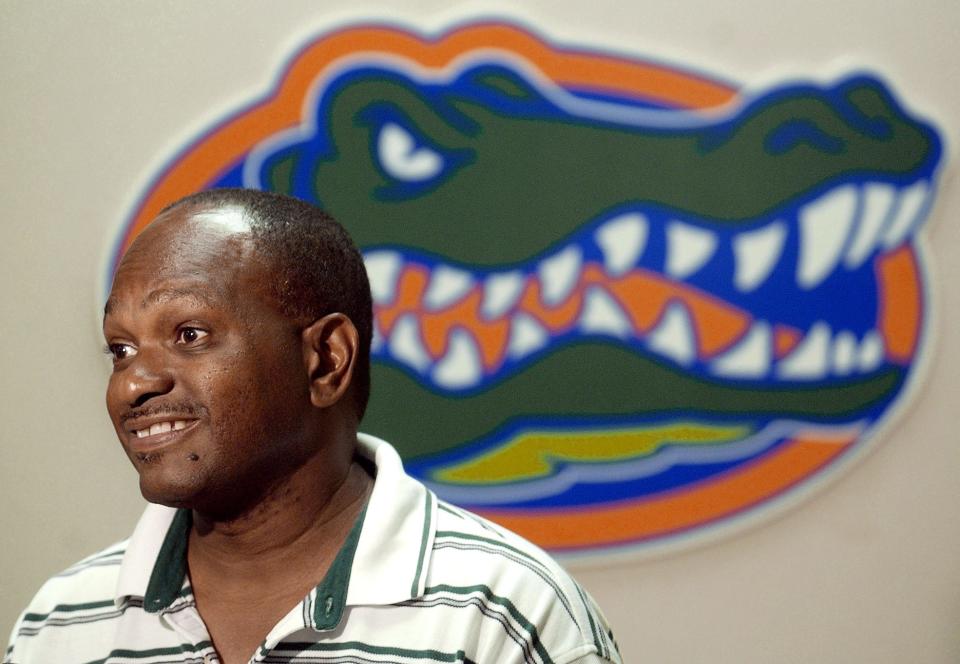 Mike Holloway talks at a press conference in 2002 when he was the newly named track and field head coach for the Gators.