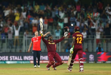 Cricket - West Indies v England - World Twenty20 cricket tournament - Mumbai, India, 16/03/2016. West Indies Chris Gayle celebrates scoring his century. REUTERS/Danish Siddiqui