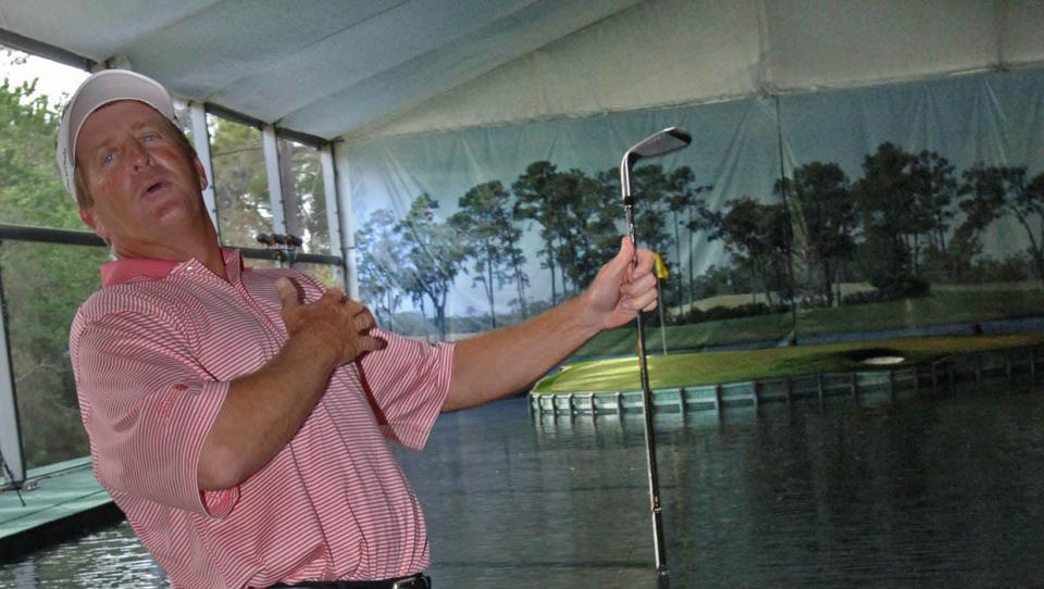 Fred Funk, the 2005 Players champion, is among the thousands of fans each year who take shots at the replica of the Players Stadium Course Island Green, at the Stadium Village.