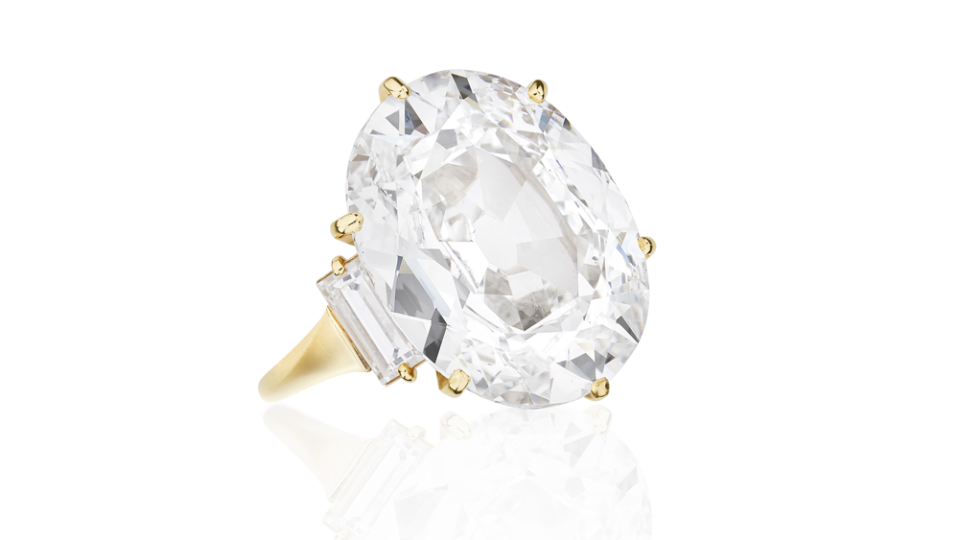 Fred ring set with a 15.60-carat diamond, accented with baguette diamonds