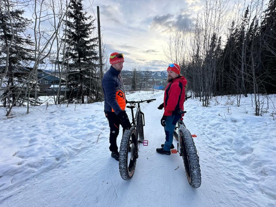 Harri Vaarala, left, and Pekka Tahkola, right, explore Whitehorse's multi-use paths.