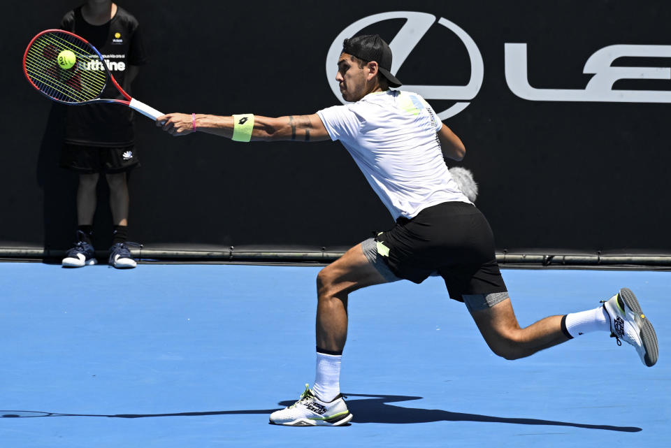 Alejandro Tabilo of Chile plays a backhand return to Taro Daniel of Japan during the final of the ASB Classic tennis tournament in Auckland, New Zealand, Saturday, Jan. 13, 2024. (Andrew Cornaga/Photosport via AP)