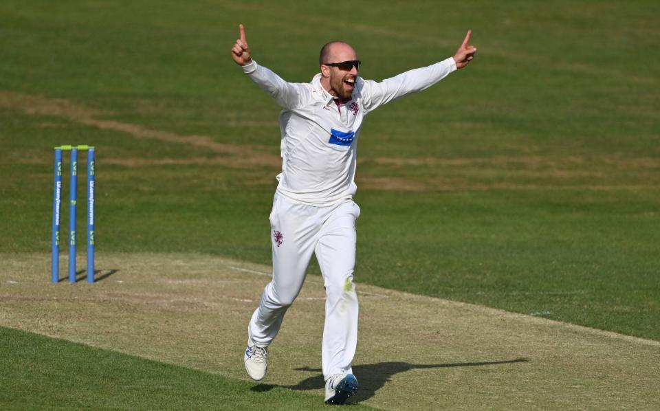 Jack Leach of Somerset celebrates taking the wicket of Marcus Harris of Gloucestershire - Getty Images
