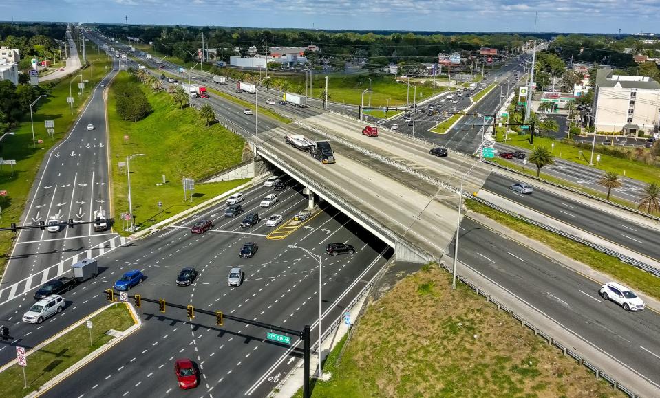 Traffic makes its way north and south at the Interstate 75/State Road 200 interchange Tuesday afternoon. AAA predicts 13% more travelers this year compared to 2020. [Doug Engle/Ocala Star-Banner]2021