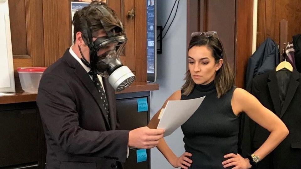 Matt Gaetz tweeted this photo of himself reviewing the coronavirus supplemental appropriation and preparing to vote while wearing a gas mask on March 4, 2020.