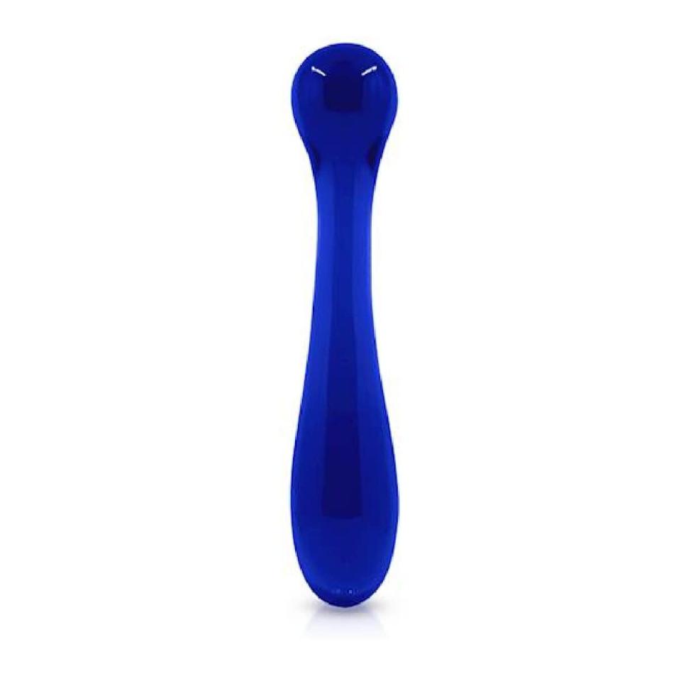 This elegant dark blue dildo might look like a vase meant for your living room, but its two ends are actually for different sensations: One is longer and narrower for deep penetration, and the other is rounded for G-spot stimulation. “The bulbous tip will stimulate the body as it moves in and out,” says Hewitt. $25, Adulttoymegastore. <a href="https://adulttoymegastore.com/sex-toys/female-sex-toys/g-spot-toys/crystal-pleasure-wand--675-inch--/220305/258/" rel="nofollow noopener" target="_blank" data-ylk="slk:Get it now!" class="link ">Get it now!</a>