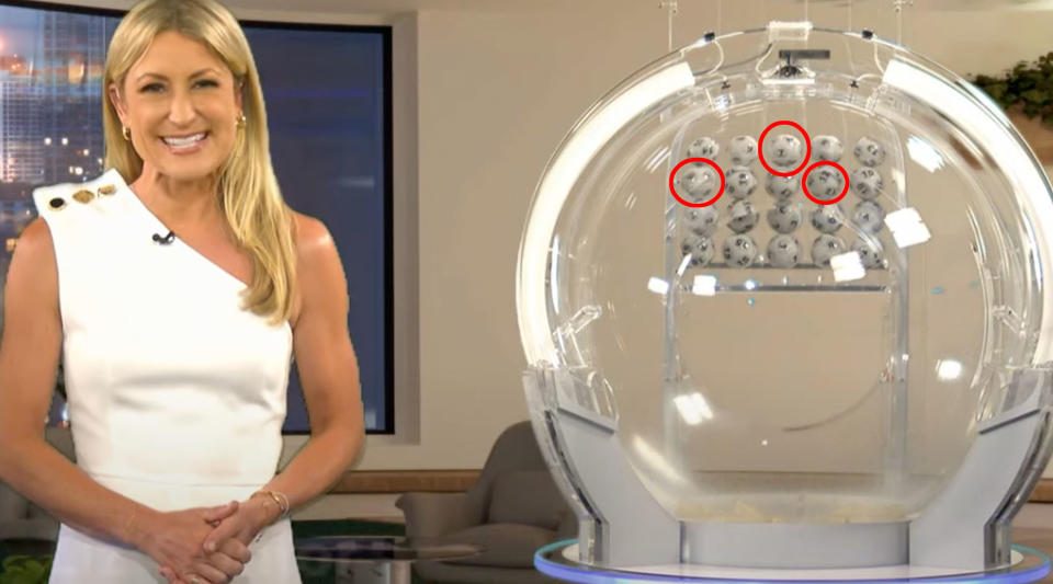 Powerball draw showing host and ball drop with three balls circled in red. 