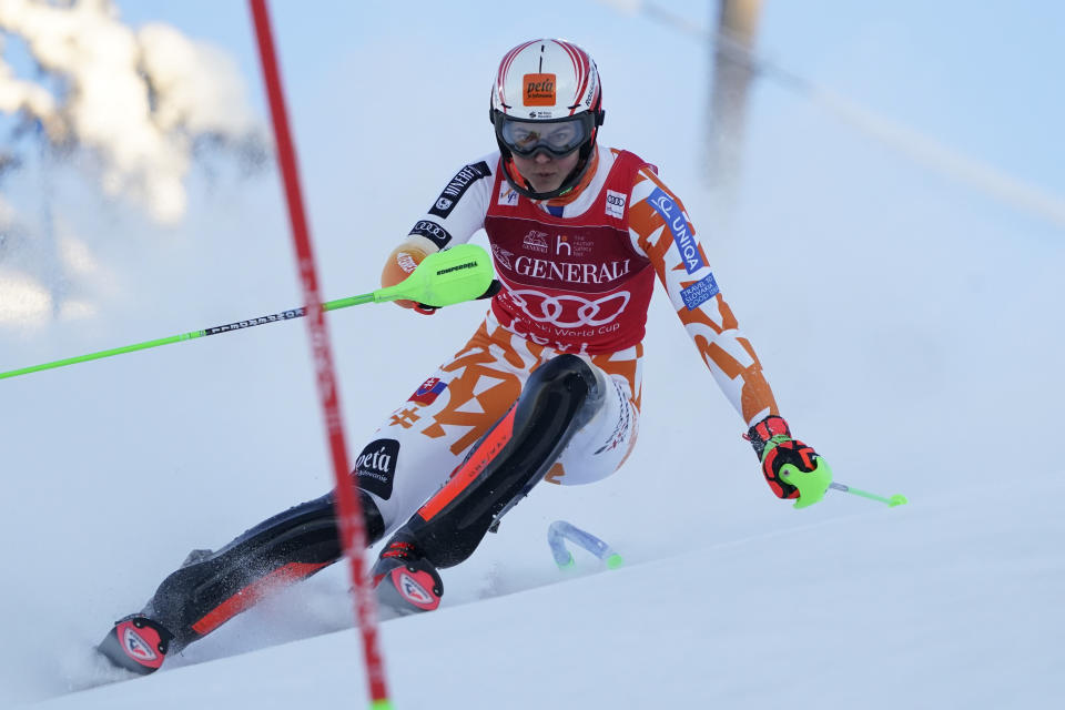Slovakia's Petra Vlhova speeds down the course during the first run of an alpine ski World Cup women's slalom race, in Levi, Finland, Sunday, Nov. 12, 2023. (AP Photo/Giovanni Auletta)