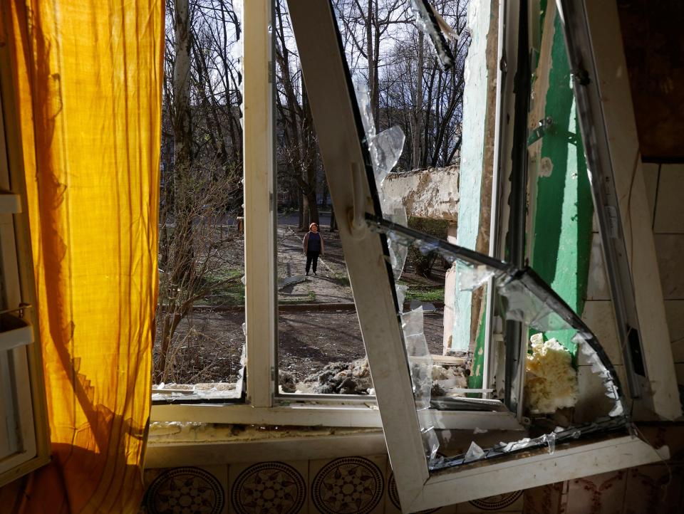 An apartment hit by shelling (REUTERS)