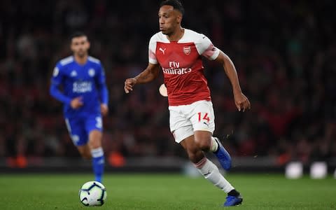 Pierre-Emerick Aubameyang of Arsenal runs with the ball during the Premier League match between Arsenal FC and Leicester City - Credit: GETTY IMAGES