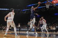 Brooklyn Nets forward Bruce Brown (1) drives to the basket during the second half of an NBA basketball game against the Cleveland Cavaliers Friday April 8, 2022, in New York. (AP Photo/Bebeto Matthews)