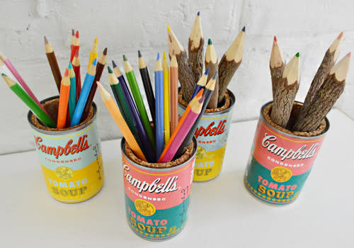 <p>Channel your inner Warhol with these pop art Campbell’s Soup pencil caddies. <a href="http://www.younghouselove.com/2012/09/soup-there-it-is/" rel="nofollow noopener" target="_blank" data-ylk="slk:This tutorial" class="link ">This tutorial </a>used the company’s limited-edition Warhol tribute labels. You can emulate the look by painting the traditional labels, or create graphic modifications in Photoshop and print new labels. (Photo: <a href="http://www.younghouselove.com/2012/09/soup-there-it-is/" rel="nofollow noopener" target="_blank" data-ylk="slk:Young House Love" class="link ">Young House Love</a>)</p>