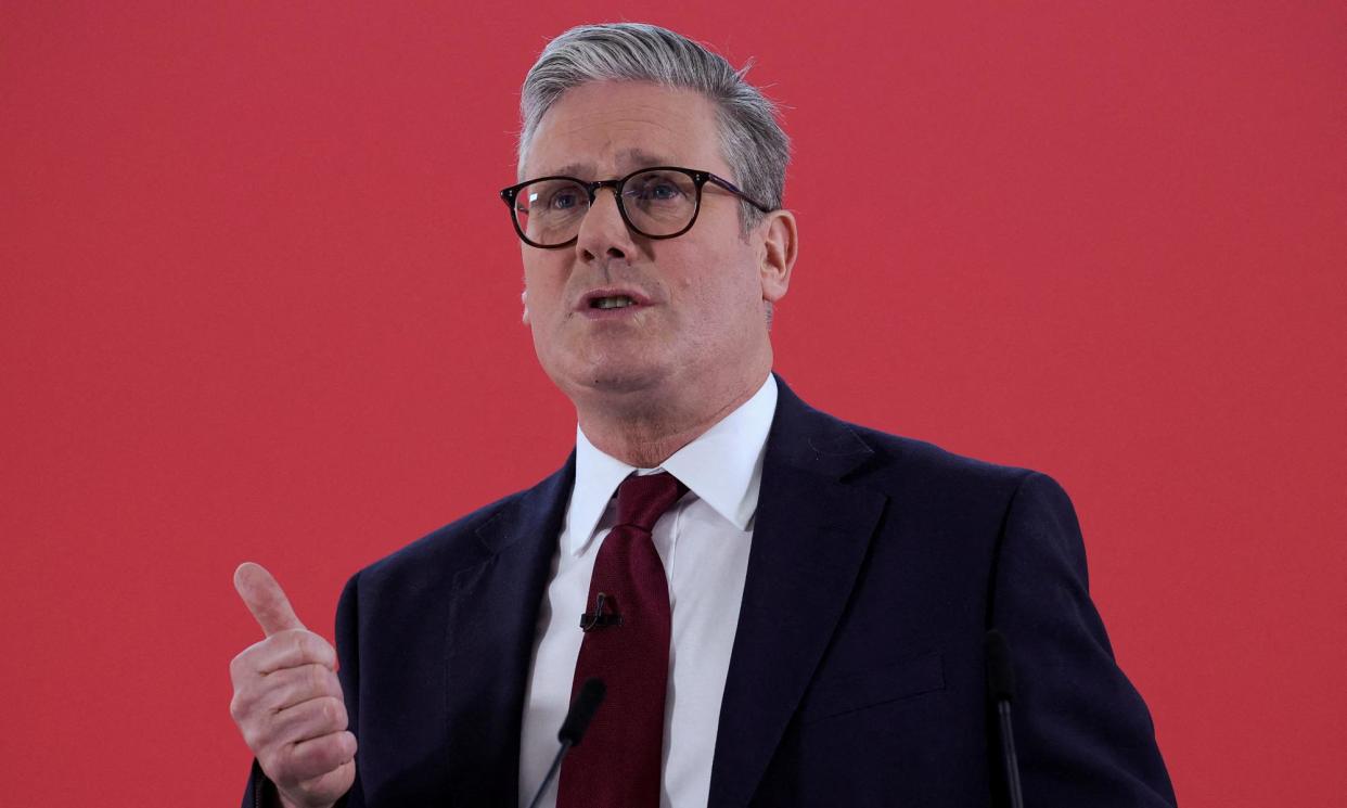 <span>Keir Starmer will be pictured with his sleeves rolled up and text about ‘my’ first steps for change.</span><span>Photograph: Carlos Jasso/Reuters</span>