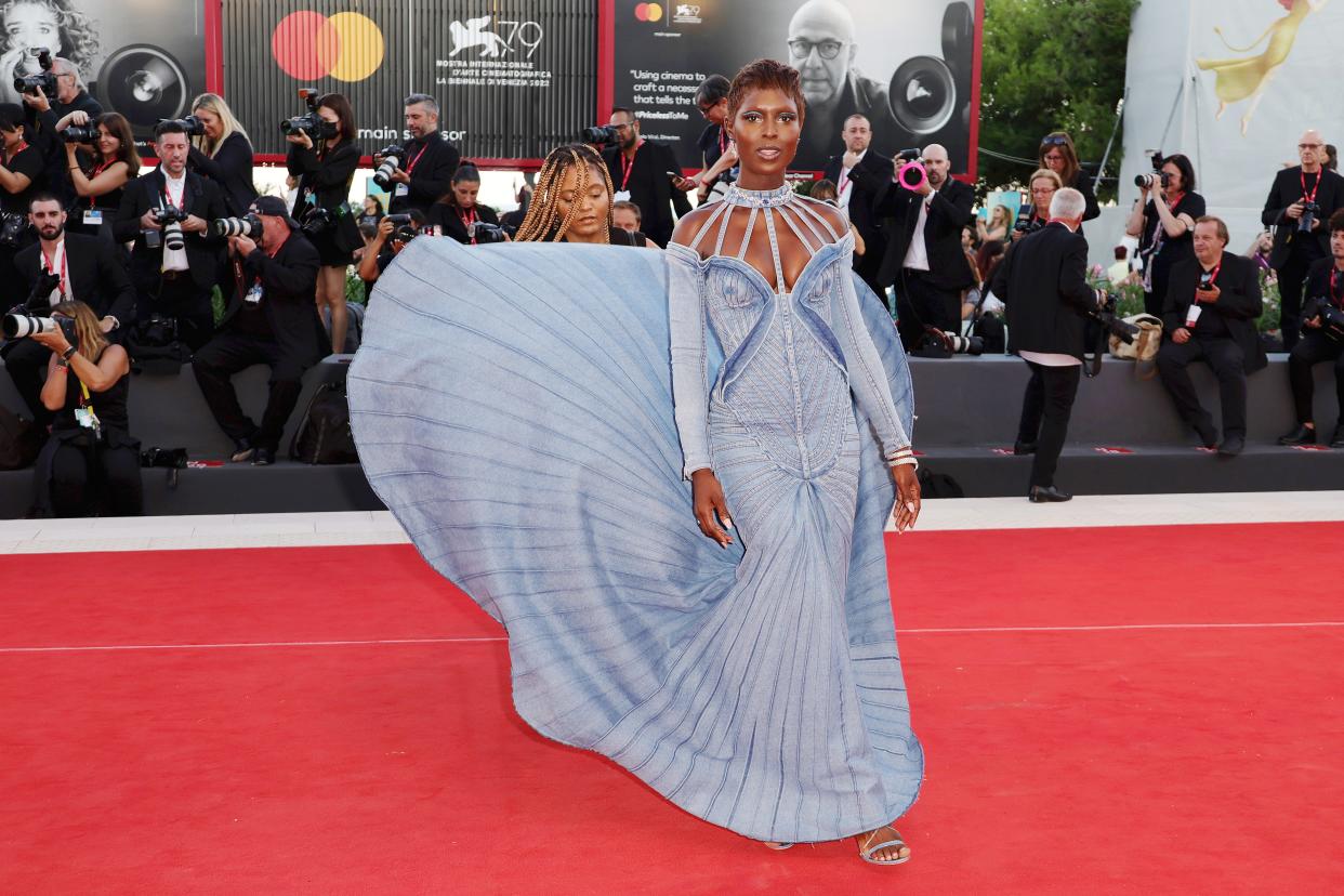 Jodie Turner-Smith in a denim gown on the red carpet of the Venice International Film Festical