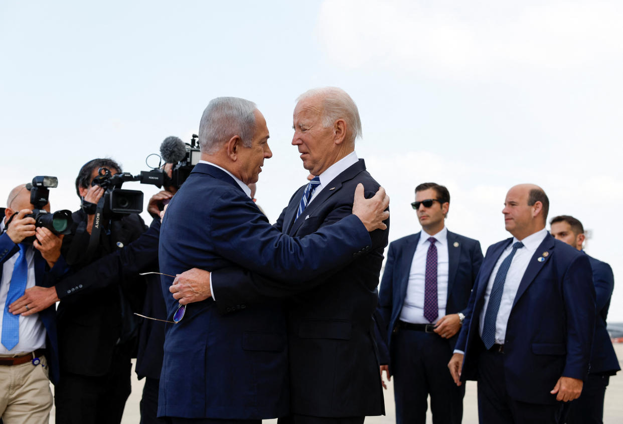 President Joe Biden is welcomed by Israeli Prime Minster Benjamin Netanyahu in Tel Aviv on Oct. 18.