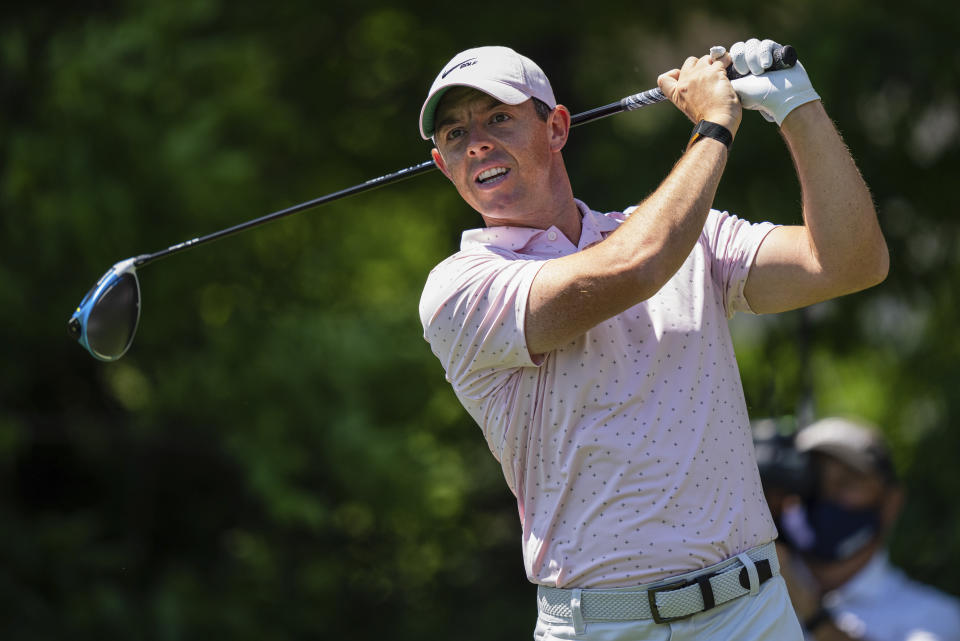 Rory McIlroy tees off on the seventh hole during the fourth round of the Wells Fargo Championship golf tournament at Quail Hollow on Sunday, May 9, 2021, in Charlotte, N.C. (AP Photo/Jacob Kupferman)