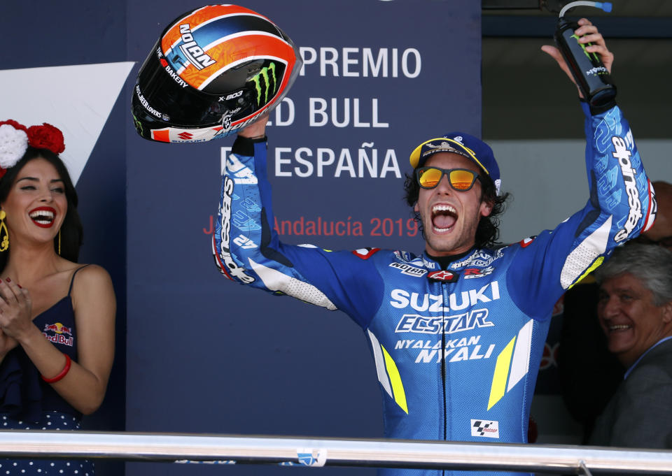 MotoGP rider Alex Rins of Spain celebrates on the podium after finishing second in the Spanish Motorcycle Grand Prix at the Angel Nieto racetrack in Jerez de la Frontera, Spain, Sunday, May 5, 2019. (AP Photo/Miguel Morenatti)