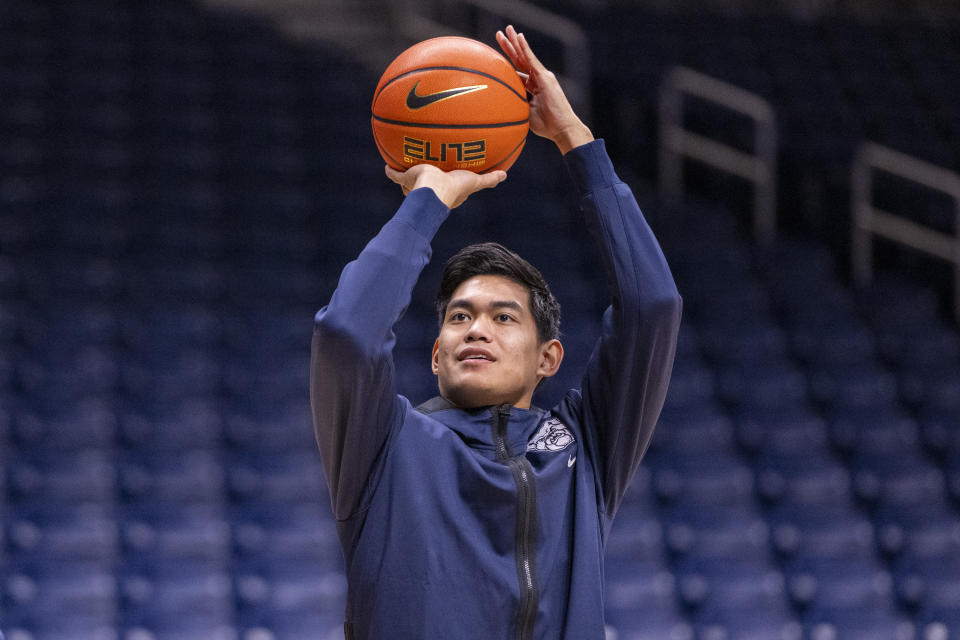 Butler forward Christian David warms up for the team's NCAA college basketball game against Xavier, Friday, Jan. 7, 2022, in Indianapolis. (AP Photo/Doug McSchooler)