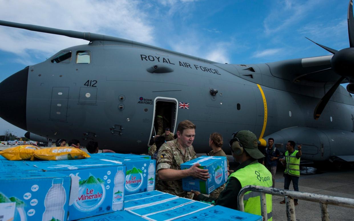 Aid for earthquake and tsunami survivors is loaded onto an RAF aircraft in Indonesia  - Army