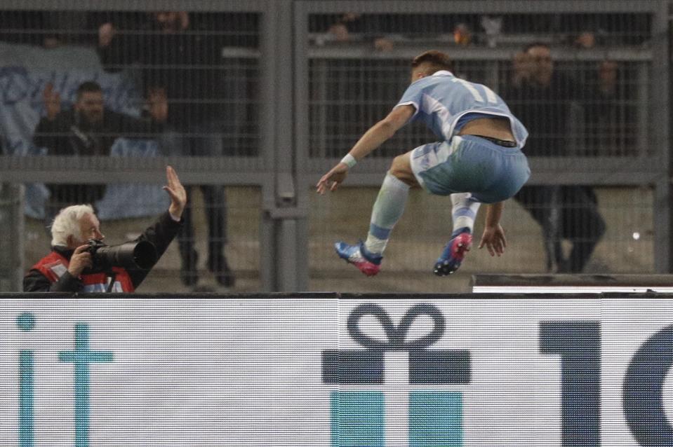 Lazio's Ciro Immobile celebrates after scoring during an Italian Cup, first-leg, semifinal soccer match between Lazio and Roma, at the Rome Olympic stadium, Wednesday, March 1, 2017. (AP Photo/Gregorio Borgia)