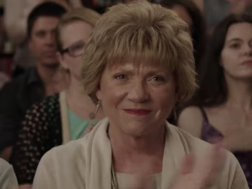 andrew rannells and Becky Ann Baker clapping in a scene from girls