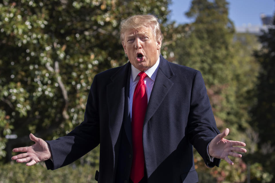 President Trump speaks to reporters after returning to the White House on Sunday. (Photo: Manuel Balce Ceneta/AP)