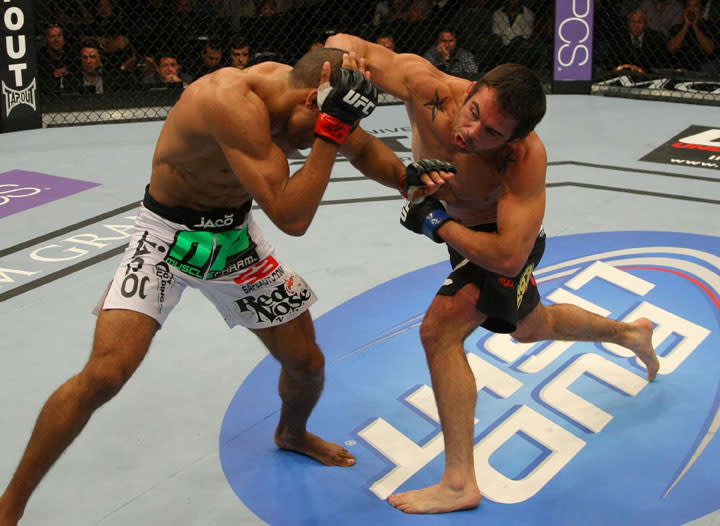 LAS VEGAS, NV - MAY 26: Jamie Varner (R) punches Edson Barboza during a lightweight bout at UFC 146 at MGM Grand Garden Arena on May 26, 2012 in Las Vegas, Nevada.